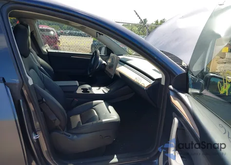 2023 Tesla Model Y Awd/Long Range Dual Motor All-Wheel Drive from USA, damaged, VIN 7SAYGAEE5PF860614